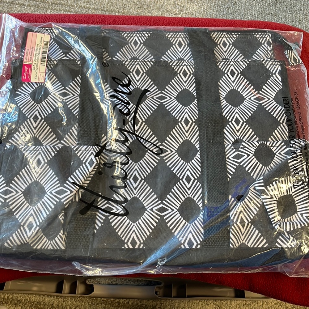 Zip top organizing tote. New in bag